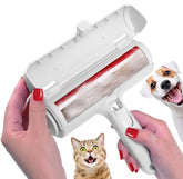 Hand holding a pet hair remover roller with collected fur inside the chamber.