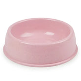 Soft pastel pink round mouth pet bowl made from eco-friendly wheat straw.