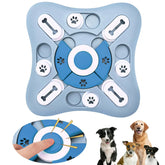 An arctic azure light blue interactive memory training dog puzzle toy slow feeder showing its central squeaker horn and sliding treat compartments.