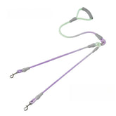 ewel-tone gradient dual dog leash with a padded gray handle and 360-degree tangle-free swivel clips for two dogs.