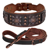 A premium wide-cut genuine black leather dog collar featuring luxury metal rivets, soft inner padding, and a heavy-duty alloy buckle with a matching black leather leash.