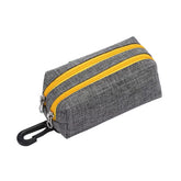 A waterproof dual-pocket Oxford fabric poop bag dispenser with Velcro straps and a key storage pocket for dog walking.