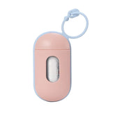 A portable pet waste bag dispenser with a hanging clip and 15 included bags for dog and cat walks.