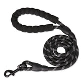 A strong midnight onyx black reinforced nylon dog leash featuring its thick woven webbing structure and soft padded comfort handle.