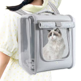 Grey large ventilated pet backpack carrier with transparent side panel and mesh window for cats and small dogs – front view