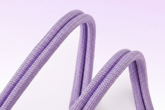 Purple rope with text about high strength polyester weaving on a light purple background