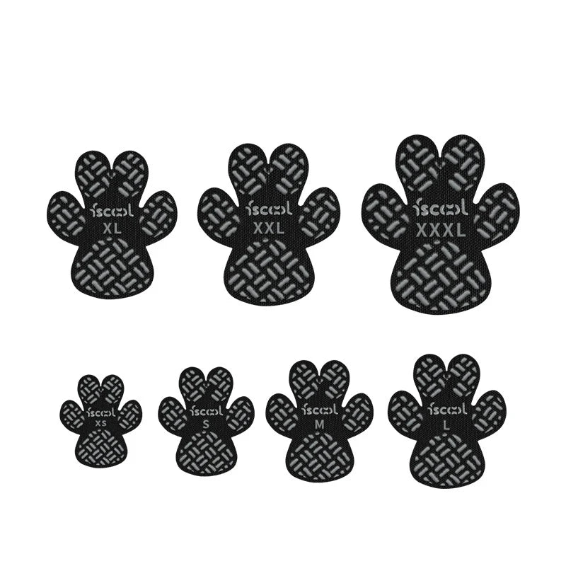 A set of black anti-slip dog paw grip pads shown in multiple sizes, designed with a textured traction pattern for paw protection.