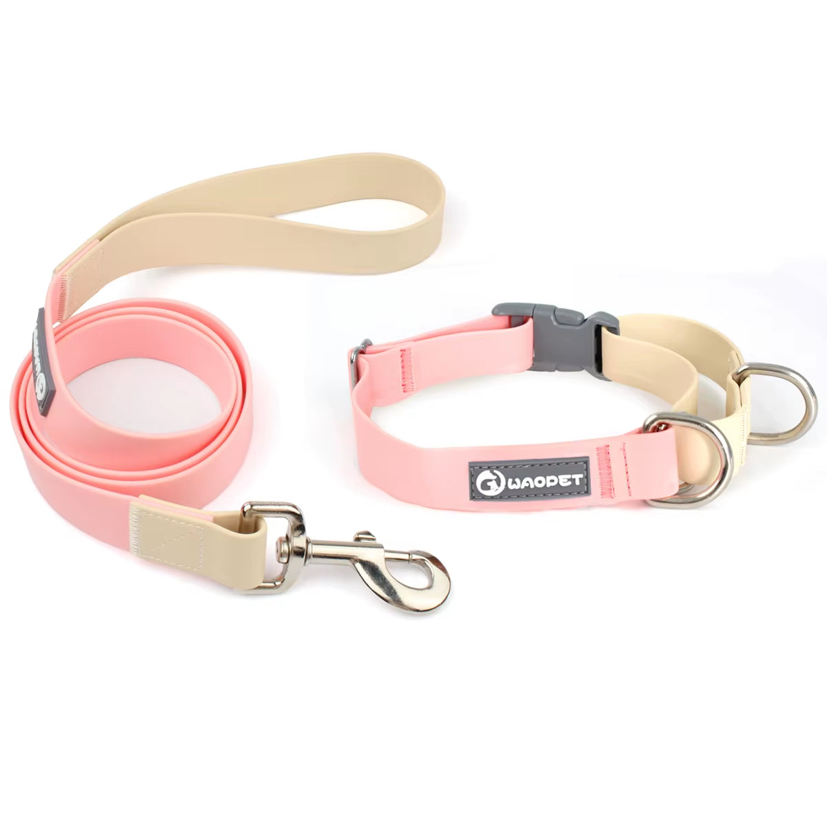 Close-up view of the adjustable PVC collar, focusing on the heavy-duty zinc-alloy dual D-rings designed for standard walking and P-chain training mode conversion.