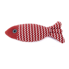 Red fish-shaped toy with white zigzag pattern on a white background