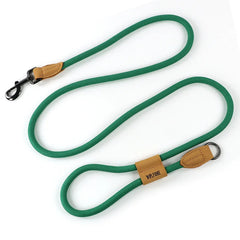 An outdoor ranger combat green hands-free dog traction lead showing its durable weather-resistant webbed strap design laying flat on a white surface.