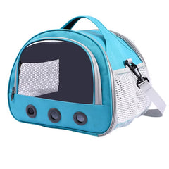 Blue portable pet travel carrier bag with mesh ventilation panels for cats and small dogs