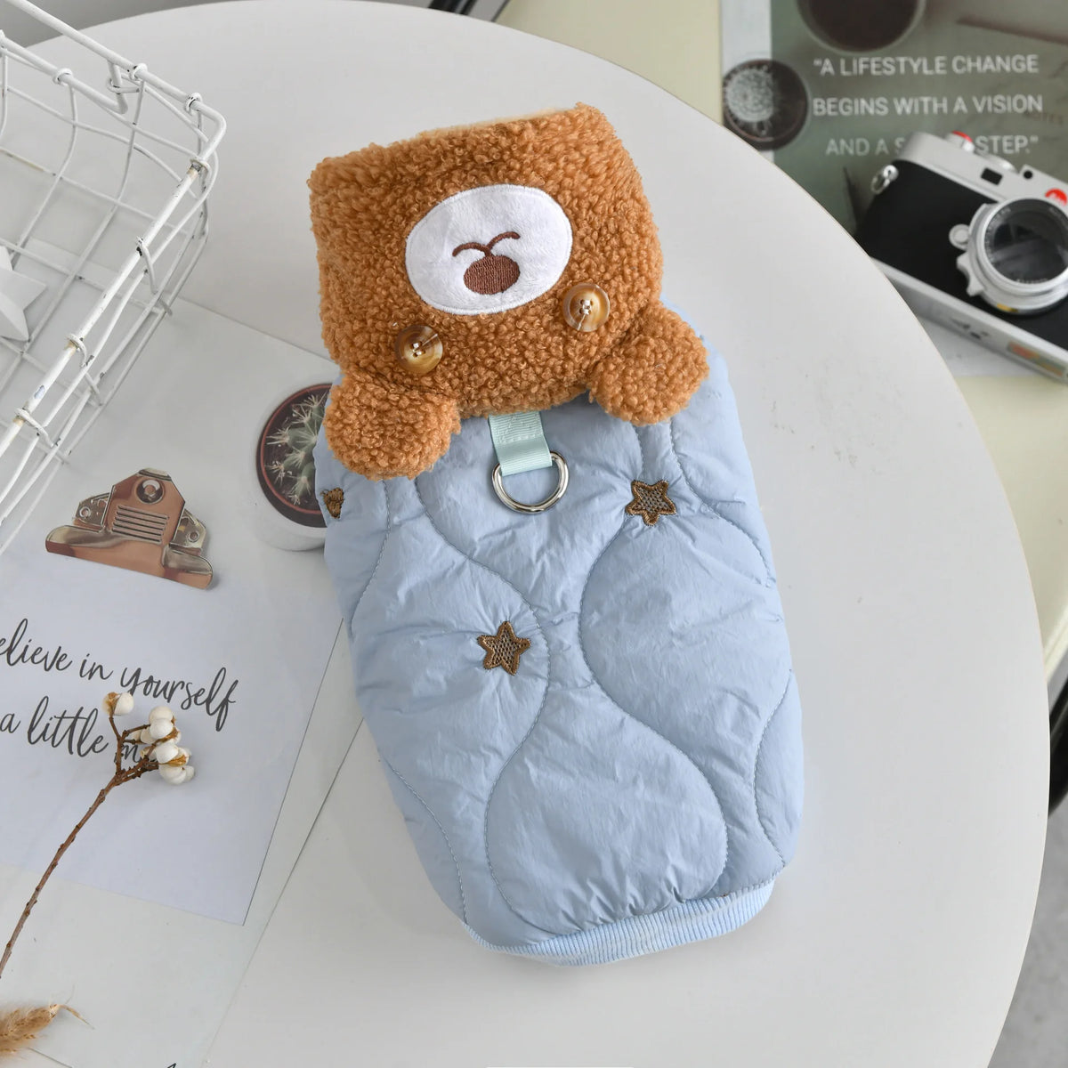 Warm quilted pet jacket with plush bear design and built‑in harness ring for small dogs and cats