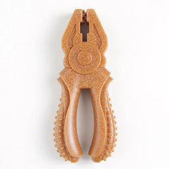 An indestructible wire-cutter-shaped eco-wood and polymer blend dog toy laid flat to showcase its splinter-free, bite-resistant solid-core construction.