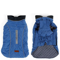 Royal blue diamond-quilted dog jacket with silver reflective strip and leash portal.