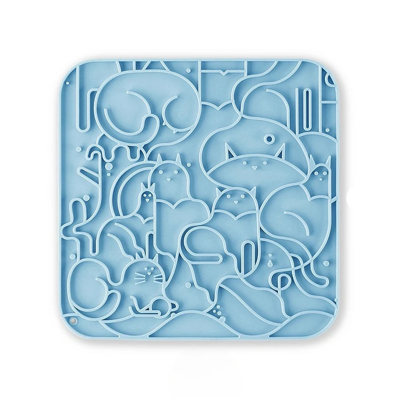 A blue slow-feeding silicone lick pad featuring a powerful suction base to help reduce pet anxiety during meals.