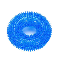 An arctic sky blue crystal-style squeaky thorn ring dog chew toy made of non-toxic natural TPR rubber displaying its texturized dental nodules.