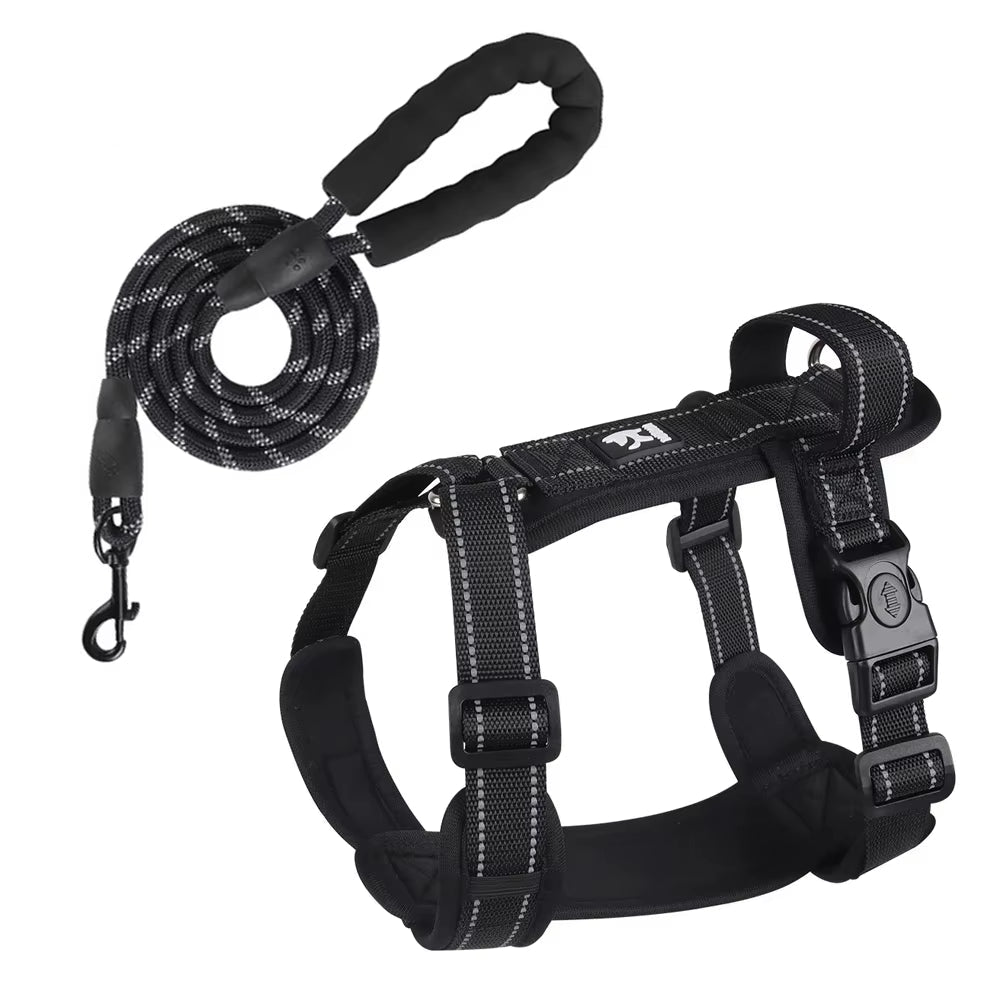 A Midnight Stealth Black reflective dog harness with a back control handle and breathable mesh interior.