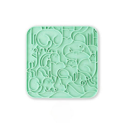 A green textured anti-choking silicone licking mat for dogs and cats with multiple suction cups for secure placement.