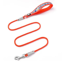 Vibrant floral printed dog leash featuring high-visibility reflective stitching and a padded handle.