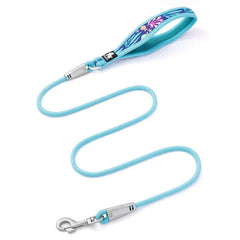 Vibrant floral printed dog leash featuring high-visibility reflective stitching and a padded handle.