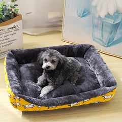 A yellow patterned soft pet sofa bed designed for winter warmth and orthopedic comfort.