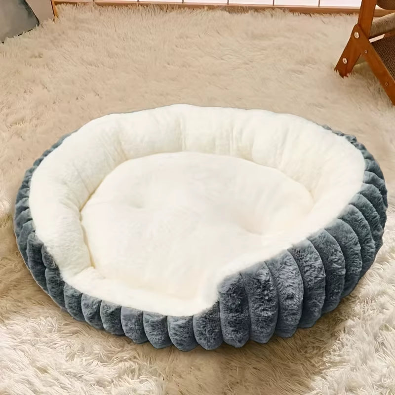 Gray orthopedic sofa-style pet bed with a sleeping cat showing the soft faux fur texture.