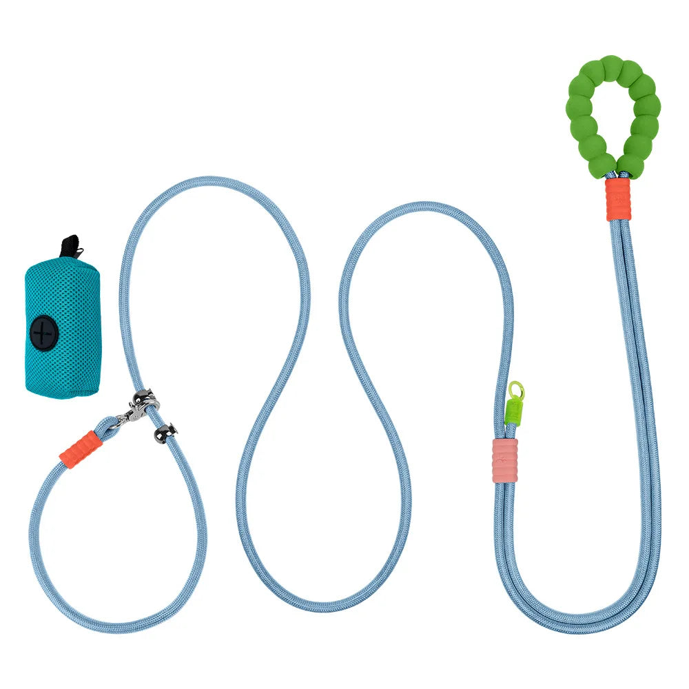 A hands-free cloud surf blue crossbody dog leash displaying its integrated elastic shock-absorbing buffer and attached matching poop bag case.