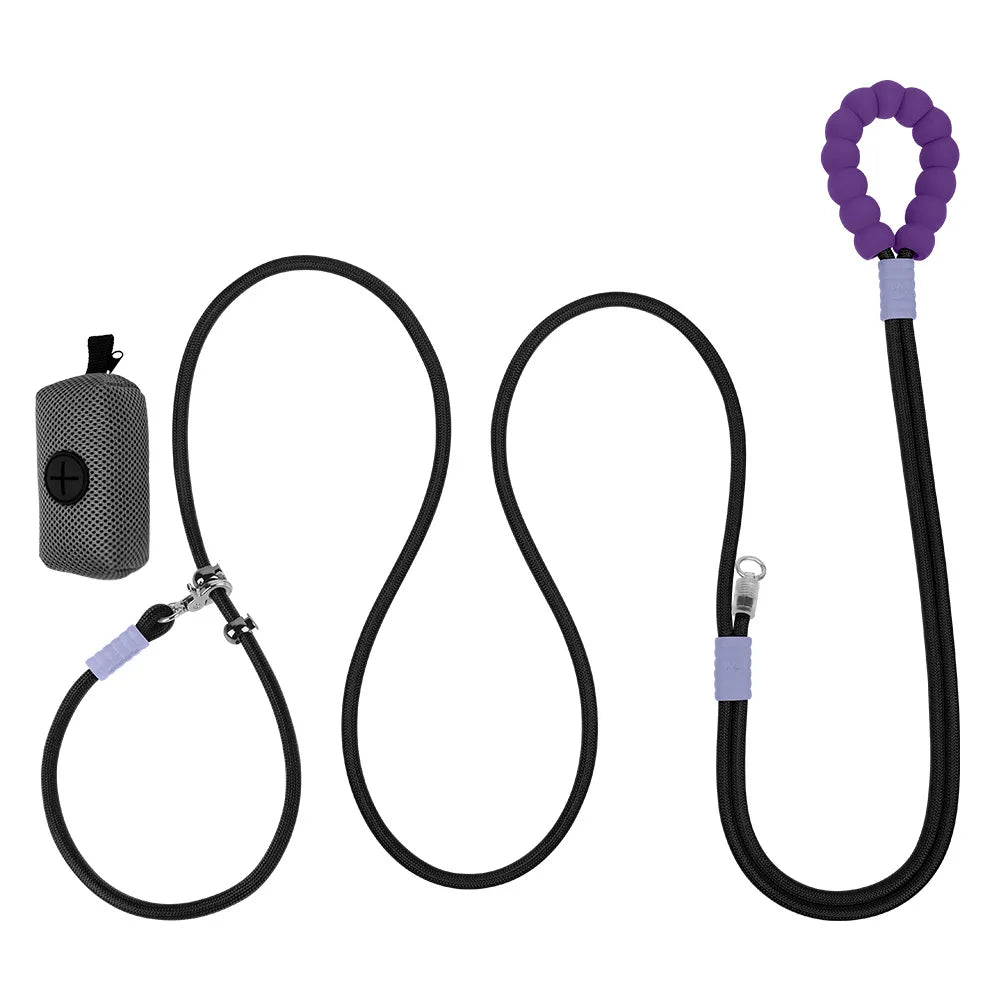 A midnight onyx black hands-free crossbody walking leash bundle laid flat to display its high-visibility reflective safety ribbons, tangle-free swivel clasp, and matching poop bag holder.