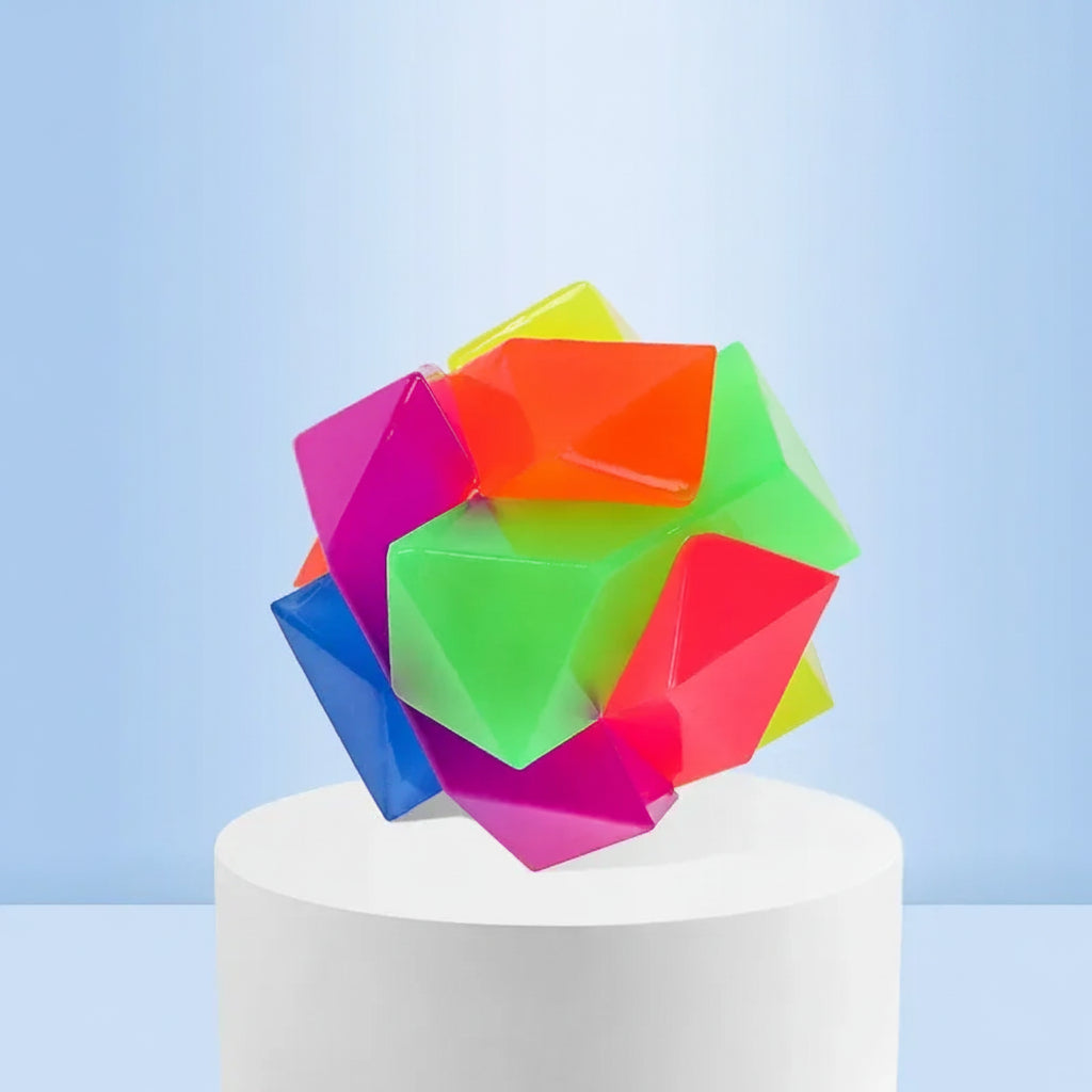 An interactive multicolor flashing TPR glow square ball displaying its solid bite-resistant rubber construction and anti-choke geometric teeth cleaning edges.