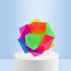 An interactive multicolor flashing TPR glow square ball displaying its solid bite-resistant rubber construction and anti-choke geometric teeth cleaning edges.