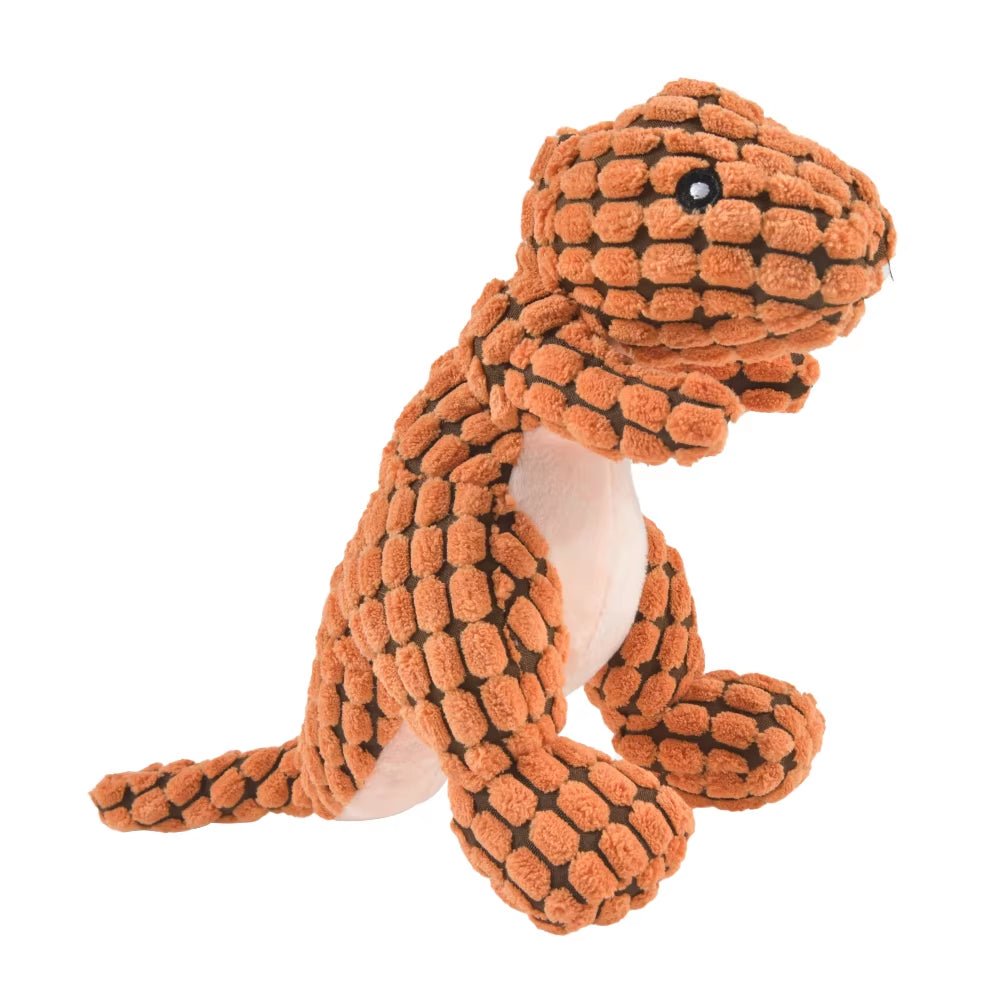 A volcanic amber orange dinosaur-shaped plush pet toy laid flat to highlight the built-in internal crinkle generator built for puppy self-entertainment.