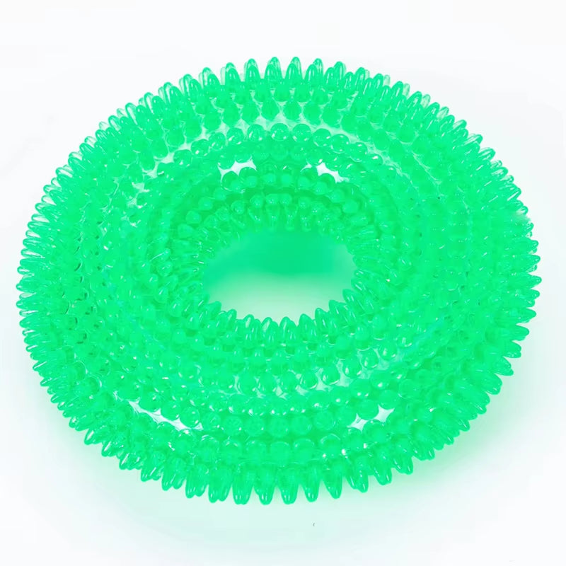A glacier mint green bite-resistant thorn ring pet toy built with an internal sound device for interactive chewing training and tartar grinding.