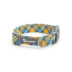 A multi-colored rainbow striped reflective nylon dog collar equipped with a professional-grade heavy-duty metal safety buckle.