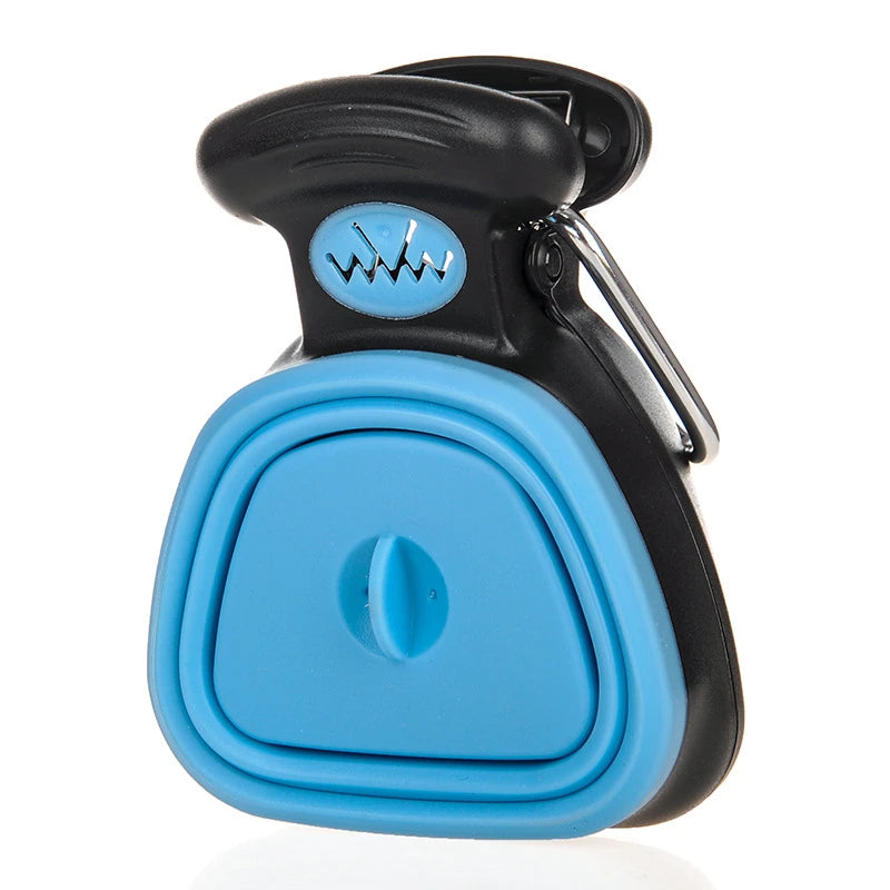 An Azure Blue foldable travel pooper scooper with an integrated bag dispenser and clip for easy dog waste collection.