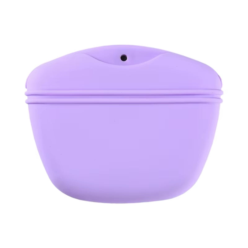 A portable purple silicone pet treat pouch with a magnetic closure and belt clip for outdoor training rewards.