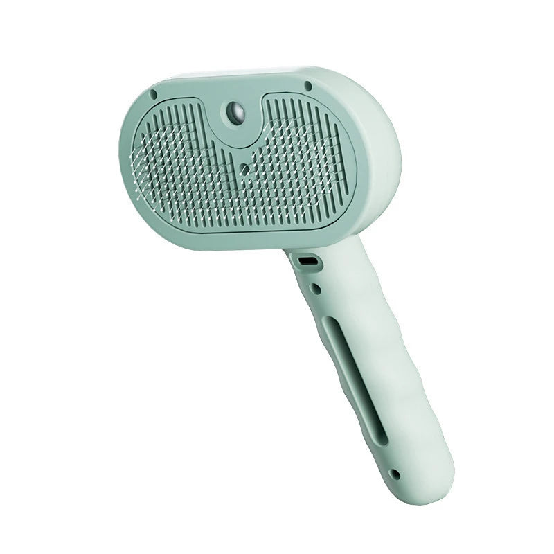 A Green electric 2-in-1 pet grooming brush with nano spray technology for mess-free deshedding of dogs and cats.
