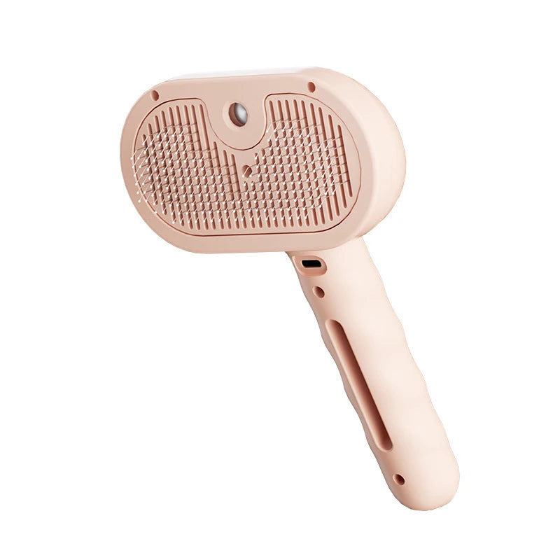 A pink electric 2-in-1 pet grooming brush with nano spray technology for mess-free deshedding of dogs and cats.