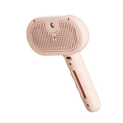 A pink electric 2-in-1 pet grooming brush with nano spray technology for mess-free deshedding of dogs and cats.
