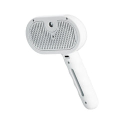 A white electric 2-in-1 pet grooming brush with nano spray technology for mess-free deshedding of dogs and cats.