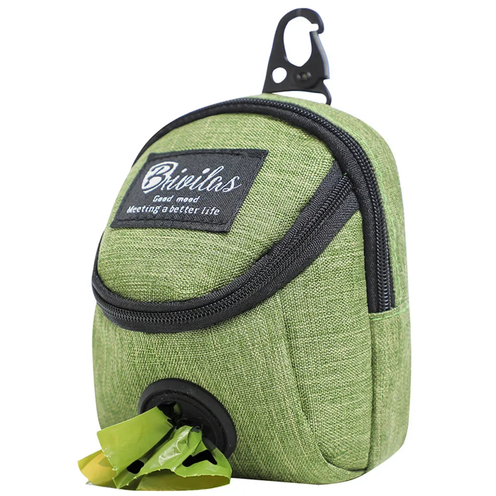A slate grey portable dog training treat pouch with a waist strap and an integrated waste bag dispenser for outdoor pet rewards.