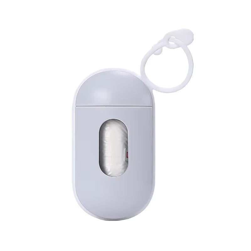 A titanium grey portable pet waste bag dispenser with a hanging clip and 15 included bags for dog and cat walks.