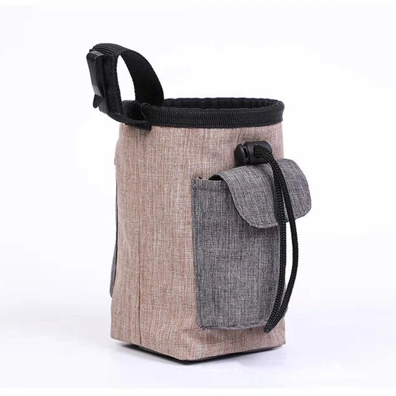 A professional blue pet training waist bag featuring multiple pockets for snacks, keys, and waste bags for outdoor puppy training.