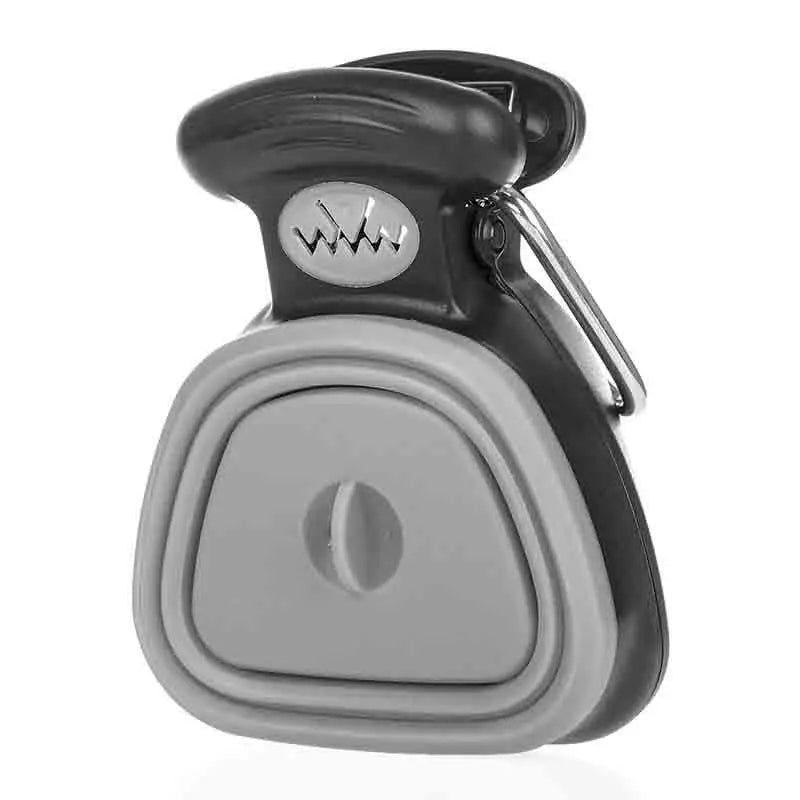 A Titanium Grey portable pet waste collector shown in its compact, folded state for easy travel and storage.