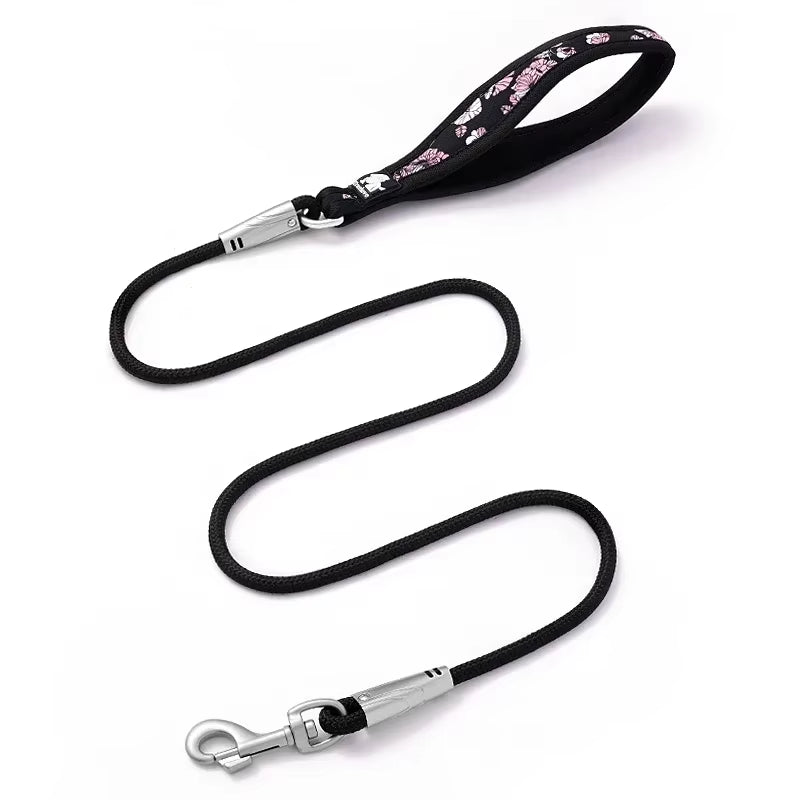 Vibrant floral printed dog leash featuring high-visibility reflective stitching and a padded handle.