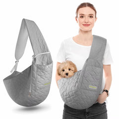 A sophisticated grey safety adjustable pet sling carrier displaying its soft padded shoulder strap and secure hands-free travel layout for small dogs.