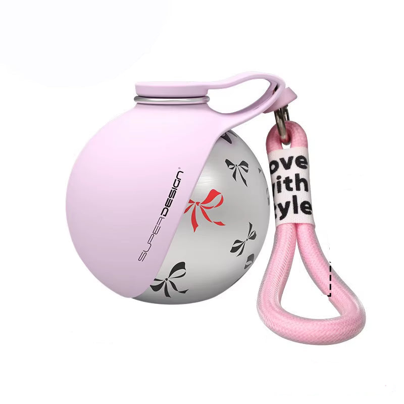 Pink silicone‑covered 285ml pet water bottle with patterned white body and loop handle for easy carrying.