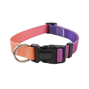 A high-density nylon pet collar and matching leash set displaying a Sunset Horizon gradient color fade from orange to pink and purple, featuring a black quick-release buckle and silver metal hardware.