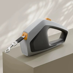 A slate charcoal grey 5m extending dog walking lead with a 360-degree rotating swivel hook for dogs and cats.