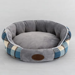 Arctic Sky Blue plaid pet bed featuring an ergonomic high-back design and soft cushioned center for winter warmth.