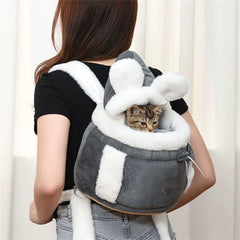 Gray cosy plush-lined winter pet carrier backpack with bunny ear detailing for cats and small dogs